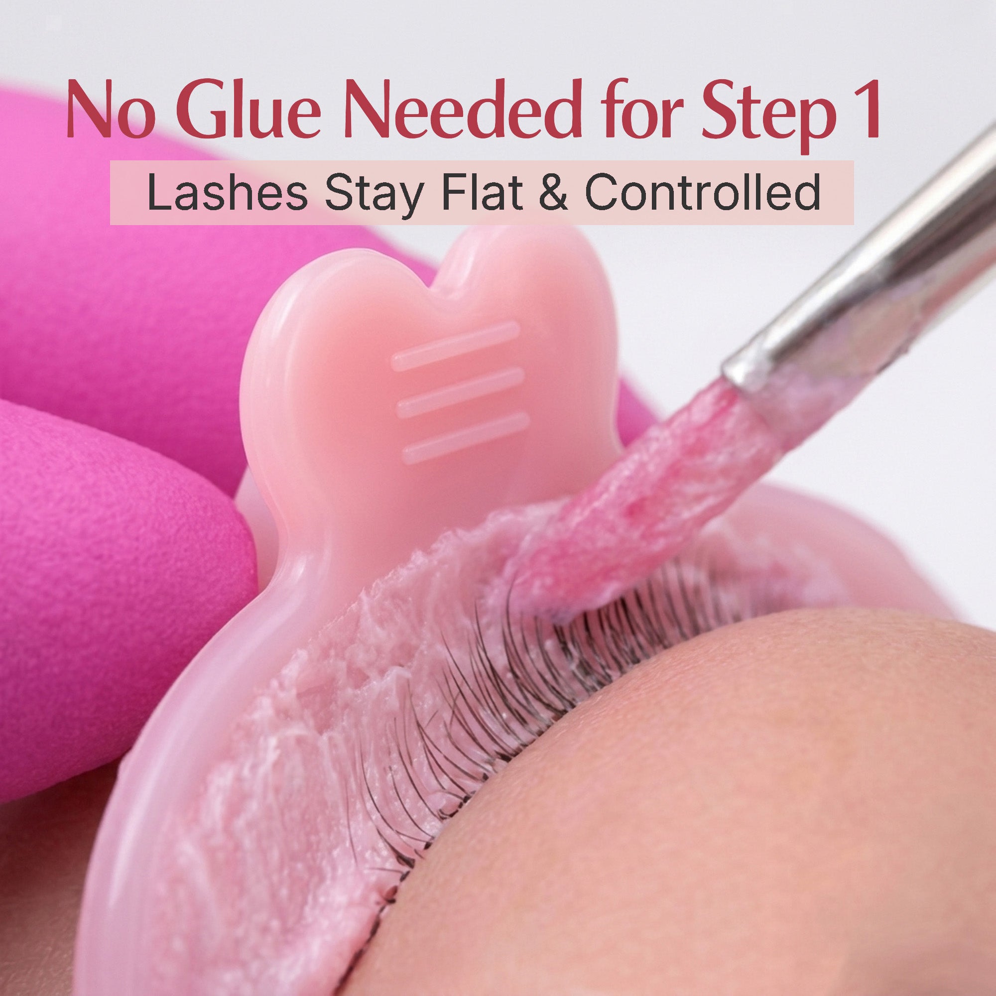 Step 1 softening lotion applied to lashes arranged flat on a pink YSEN’S reverse lash lift shield