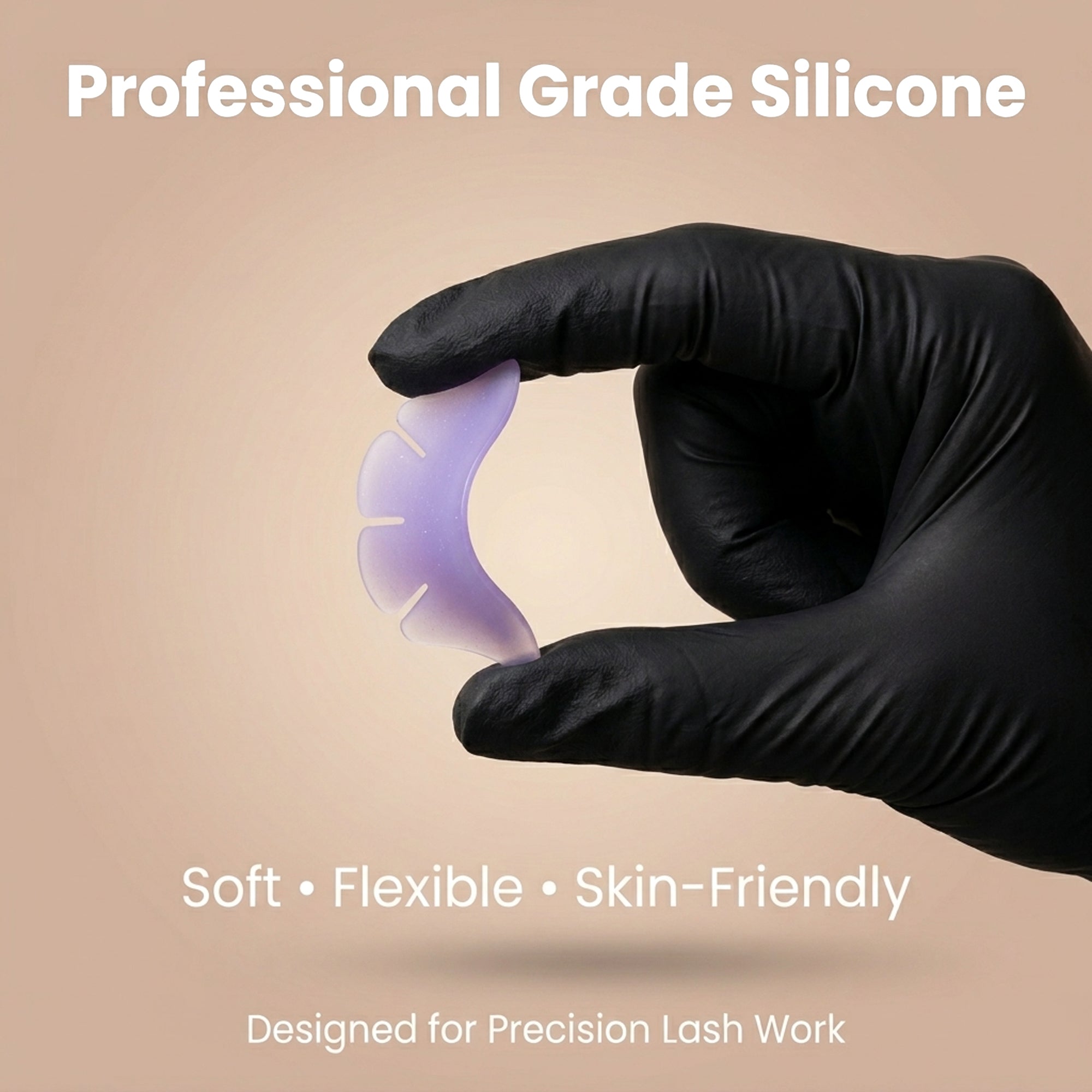 Flexible purple glitter silicone lower lash shield bent between gloved fingers to show its segmented edge