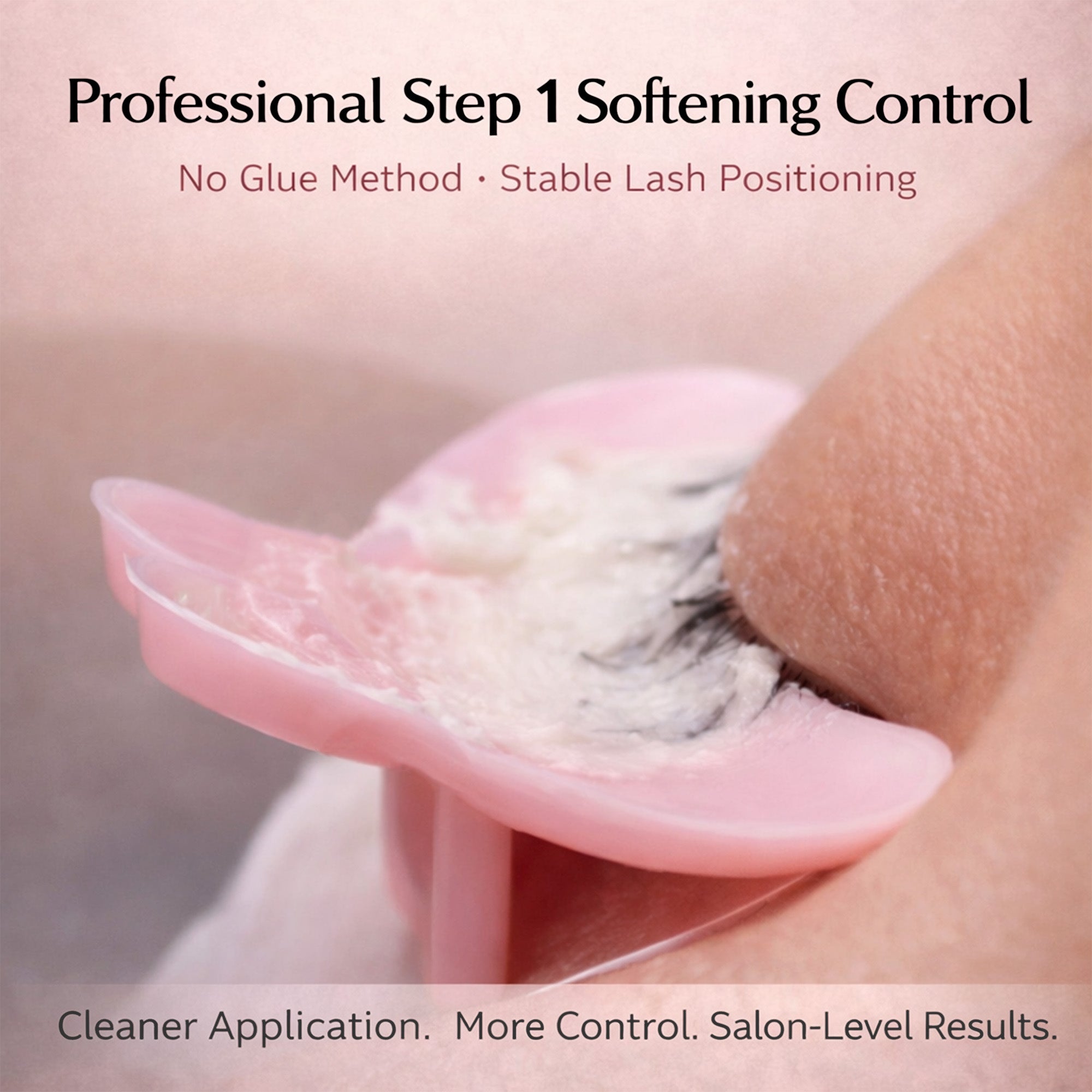 Close-up of natural lashes held flat on a pink YSEN’S reverse shield during a compatible Step 1 softening stage